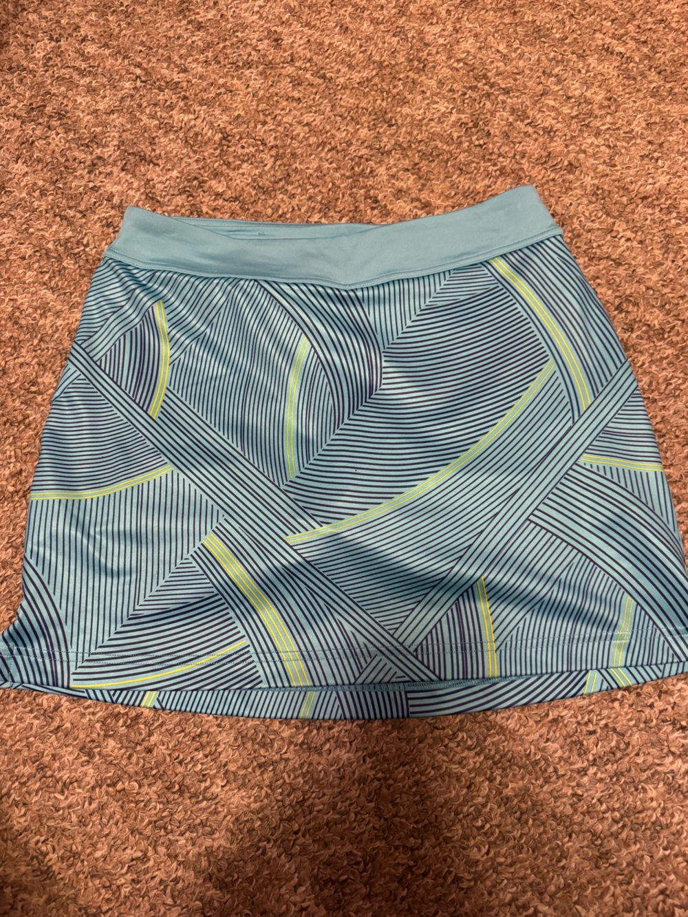 Under Armour blue and yellow golf skort NWOT